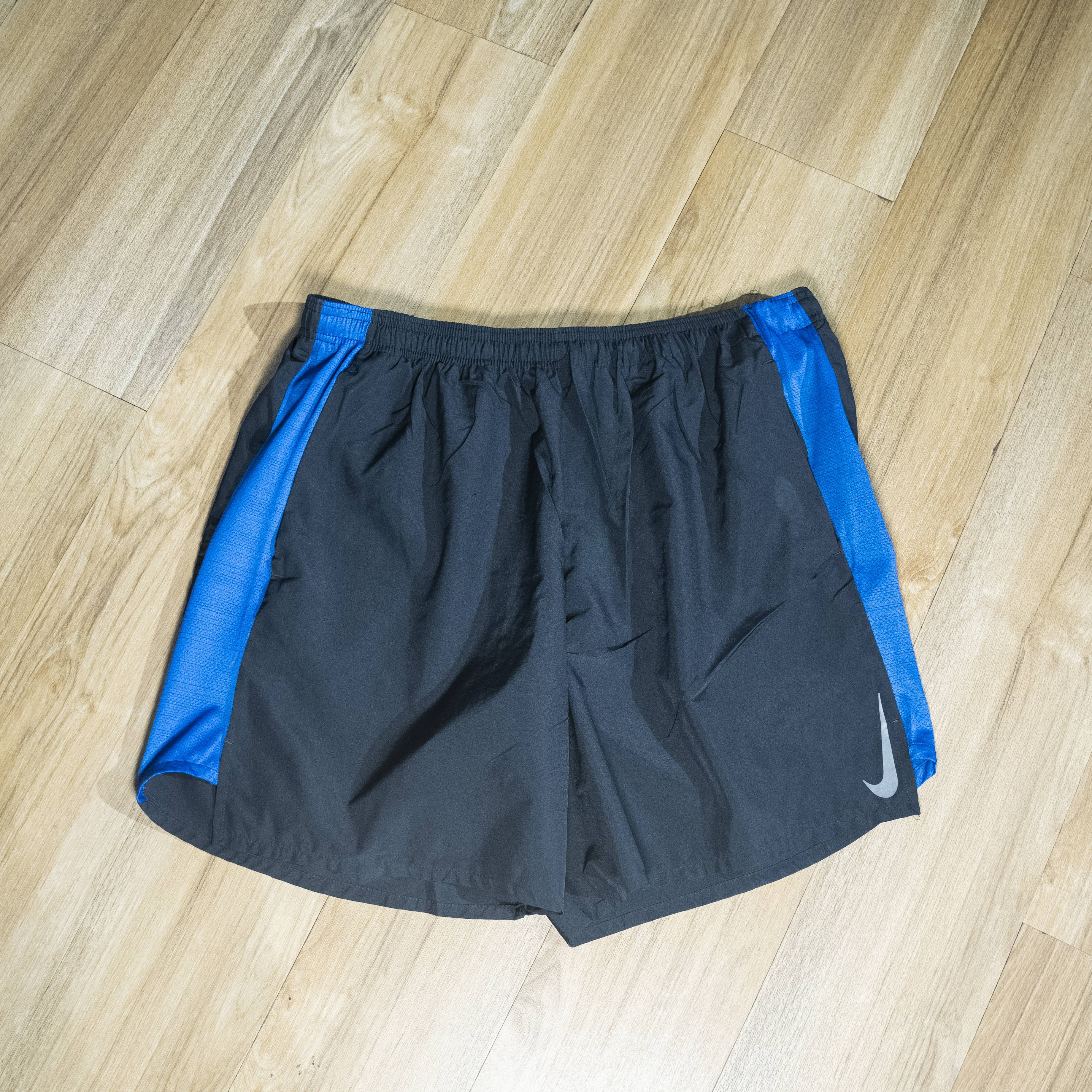 Nike Men's Black Training Shorts with Blue Side Panels