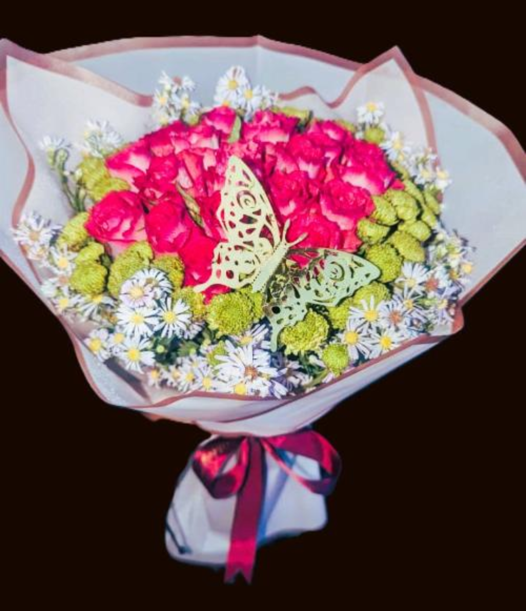 Hand bouquet of pink and white with bulterfly