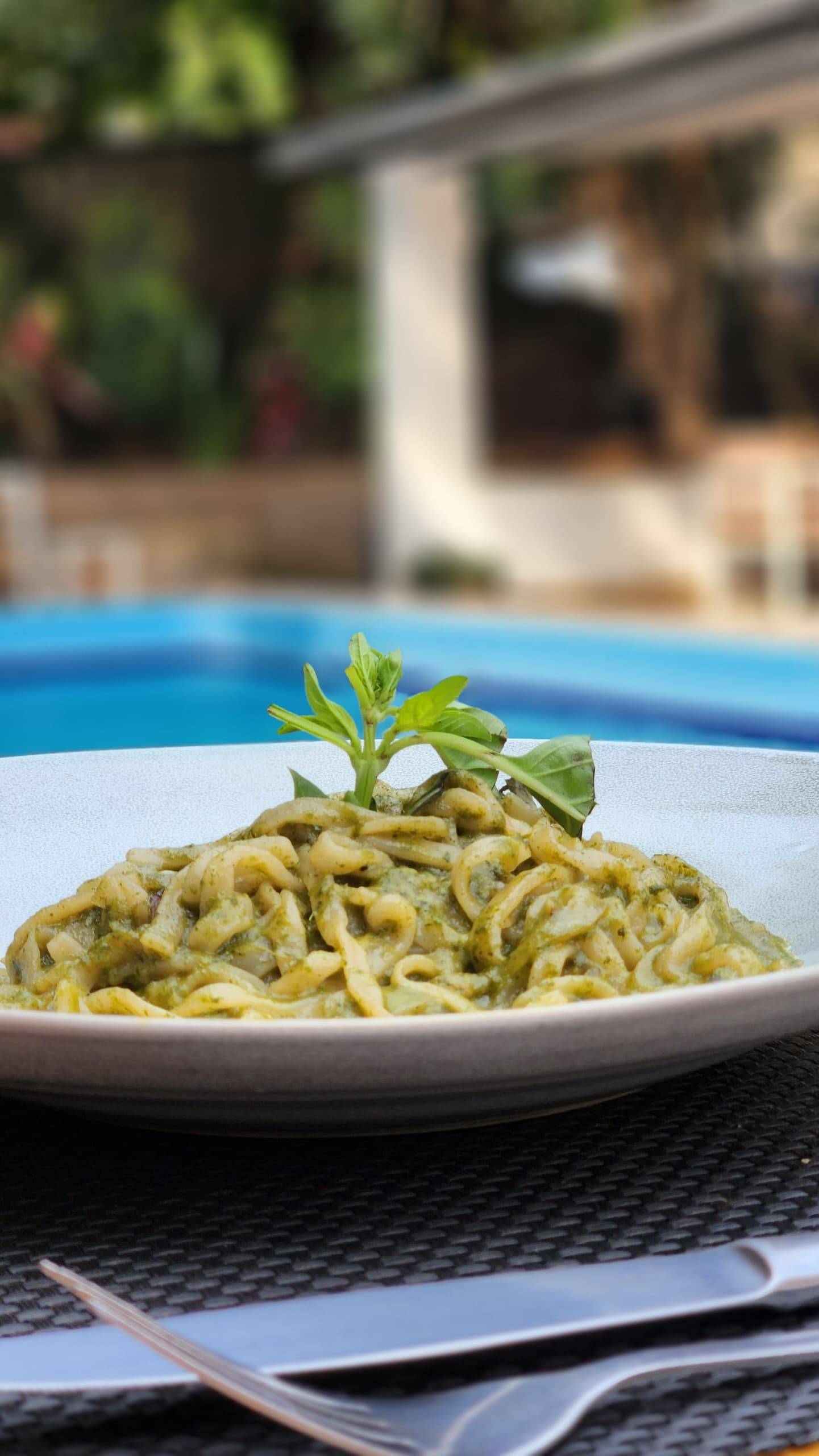 PESTO PASTA 
(Pasta tossed with creamy basil garlic and parmesan sauce)