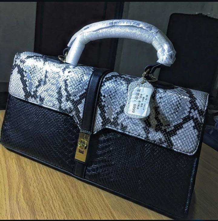 Python printed flap Boston handbag